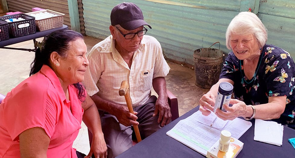 God Said Go Missions team providing medical care and prayer in rural Guatemala.